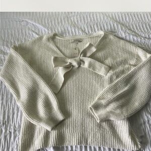 Francesca's Collections Cream V-Neck Sweater with Elegant Bow Detail